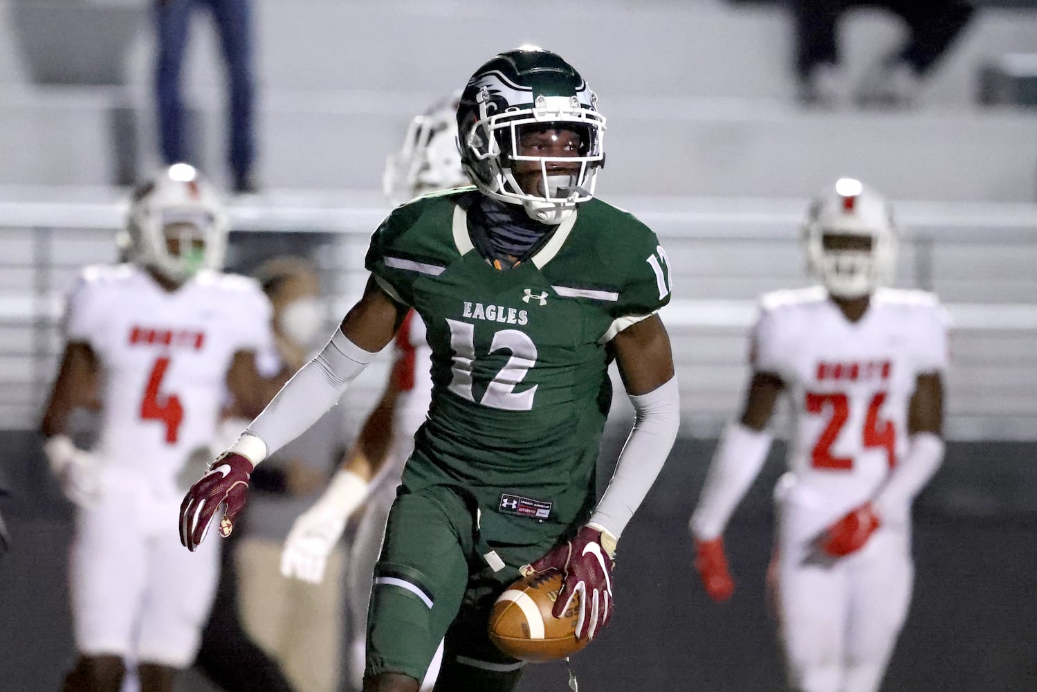 Collins Hill wide receiver Travis Hunter (12) scores a touchdown in the first half against North Gwinnett. JASON GETZ FOR THE ATLANTA JOURNAL-CONSTITUTION