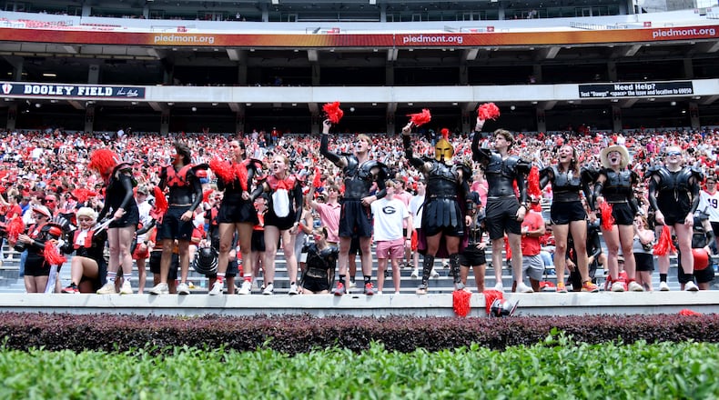 Georgia fans cheer during G-Day at Sanford Stadium on Saturday, April 18, 2026, in Athens. Fans who won't be able to make it to Sanford Stadium next season will have new voices to listen to calling the games on the Georgia Bulldogs Sports Network — Jeff Dantzler and Jon Stinchcomb. (Hyosub Shin/AJC)