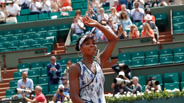 Venus Williams of the U.S. celebrates winning 6-3, 6-1, against Japan's Kurumi Nara.