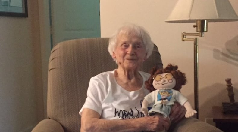 Faye Butler and her Margaret doll