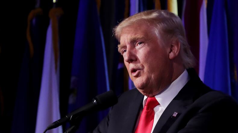 President Donald Trump signed an executive order Friday aimed at rolling back Dodd-Frank, the sweeping post-Great Recession financial overhaul law. But the rollback could be slow and limited, a Georgia bank industry official said. (Photo by Chip Somodevilla/Getty Images)