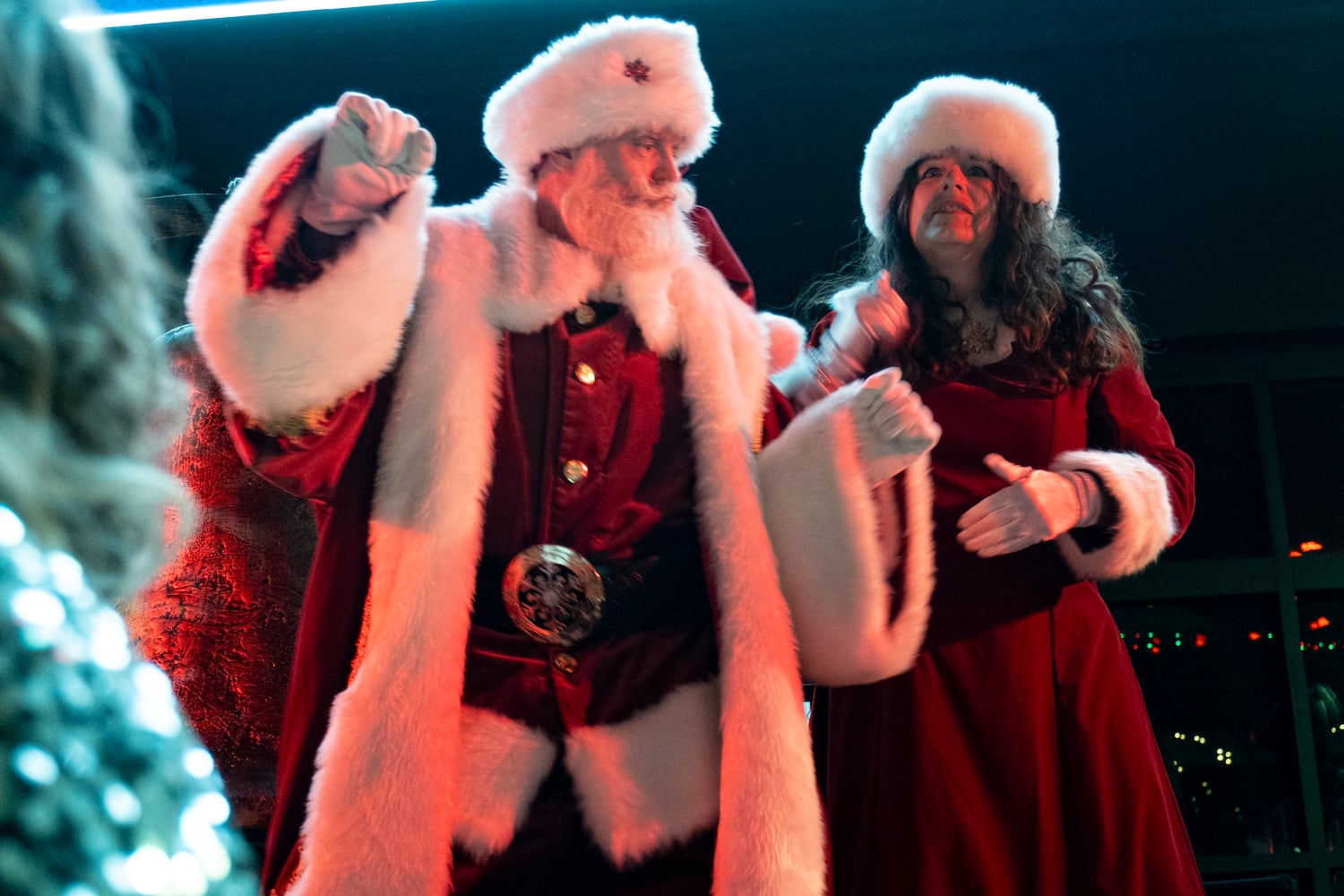 Santa and Mrs. Clause dance after lighting the Christmas tree at Atlantic Station in Atlanta on Saturday, Nov. 23, 2024.   Ben Gray for the Atlanta Journal-Constitution