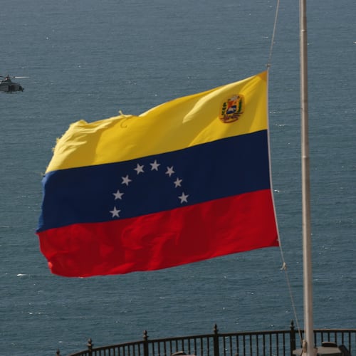 A helicopter takes off from a U.S. Navy ship docked at the seaport to support earthquake relief efforts in La Guaira, Venezuela, Monday, June 29, 2026. (AP Photo/Matias Delacroix)