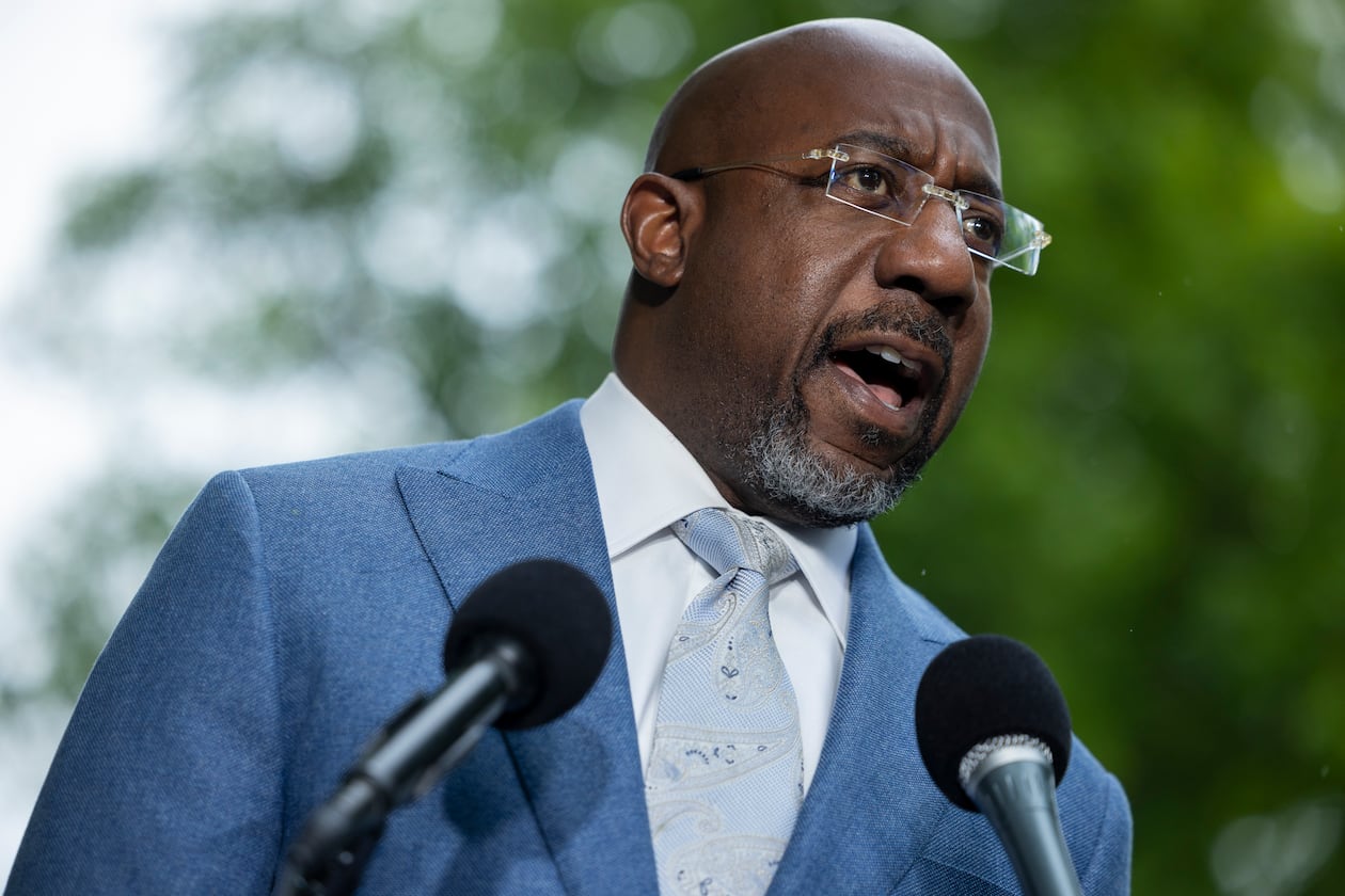 U.S. Sen. Raphael Warnock speaks at a news conference on the Voting Right’s Act, across the street from the U.S. Supreme Court, in Washington, April 2026. (Nathan Posner for the AJC)