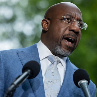 U.S. Sen. Raphael Warnock, D-Ga., speaks at a press conference on the Voting Rights Act across the street from the Supreme Court in Washington on April 29, 2026. (Nathan Posner for the AJC)