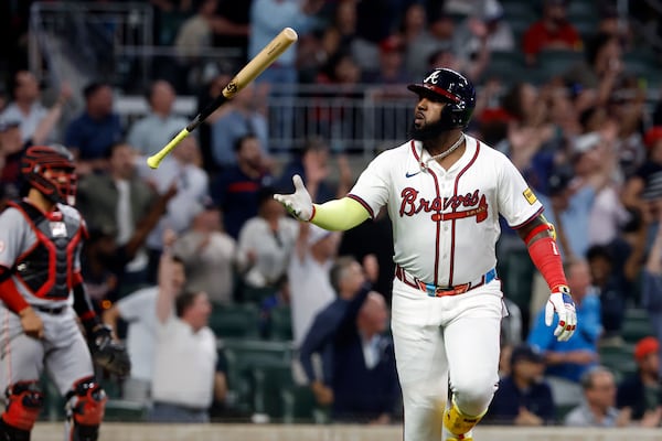 Atlanta Braves designated hitter Marcell Ozuna reacts after hitting a walk off RBI during the10th inning of a baseball game to beat the Cincinnati Reds, Tuesday, May 6, 2025, in Atlanta. (AP Photo/Butch Dill)