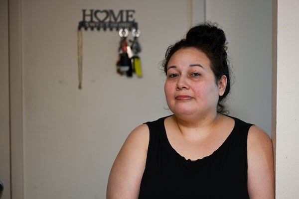 Annalinda Martinez, photographed at her home in Kennesaw Thursday, August 21, 2025, seeks to hold the Georgia Department of Human Services liable for violating her constitutional rights. (Daniel Varnado for the AJC)