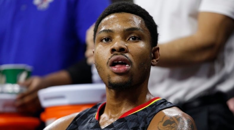 Atlanta Hawks' Kent Bazemore looks on form the bench during the second half of an NBA basketball game against the Philadelphia 76ers, Thursday, Jan. 7, 2016, in Philadelphia. The Hawks won 126-98. (AP Photo/Chris Szagola)