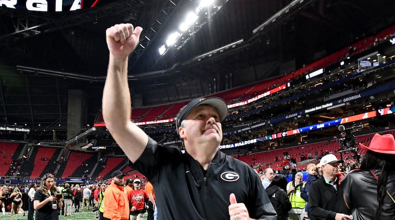 Georgia head coach Kirby Smart celebrates after defeating Alabama during the SEC championship game at Mercedes-Benz Stadium on Saturday, Dec. 6, 2025, in Atlanta. After two decommitments over the last week, the 2027 class in Athens had fallen to No. 31 nationally for the 247Sports Team Composite rankings. (Hyosub Shin/AJC)