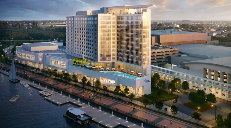 A rendering of a large, modern hotel at golden hour on Hutchison Island next to the Savannah Convention Center.