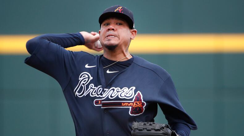 Braves starting pitcher Felix Hernandez warms up for Tuesday’s exhibition game against the Tampa Bay Rays in North Port, Fla.