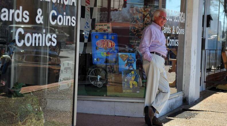 Bill Massey, who owns Middle Georgia Cards and Coins, takes a poetic approach to this year’s presidential election. “Roses are red. Violets are blue,” he said. “Your candidate stinks and mine does, too.” Massey added, “I haven’t even decided if I vote yet.” Brant Sanderlin / bsanderlin@ajc.com
