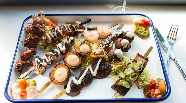 Whiskey Bird yakitori skewers with sticky soy chicken, crispy meatball, pork belly, charred octopus, sweet potato, shitake mushroom, and stuffed peppers. Photo credit- Mia Yakel.