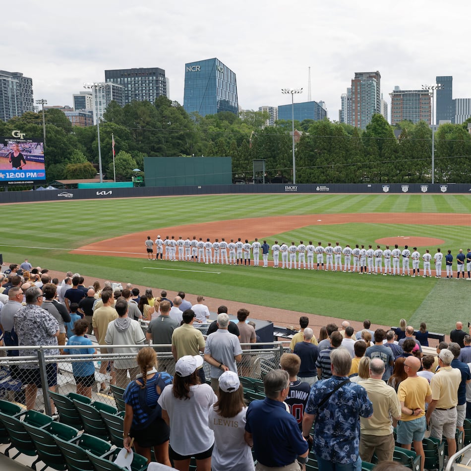 Georgia Tech and Illinois Chicago players and fans stand for the national anthem before the start of their Atlanta Regional game Friday, May 29, 2026, at Russ Chandler Stadium in Atlanta. (Erik S. Lesser for the AJC)