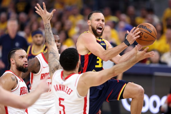 Golden State Warriors' Stephen Curry drives to the basket against Houston Rockets' Fred VanVleet in the first half of an NBA Playoffs' First Round Game 4 at Chase Center in San Francisco on Monday, April 28, 2025.(Scott Strazzante/San Francisco Chronicle via AP)
