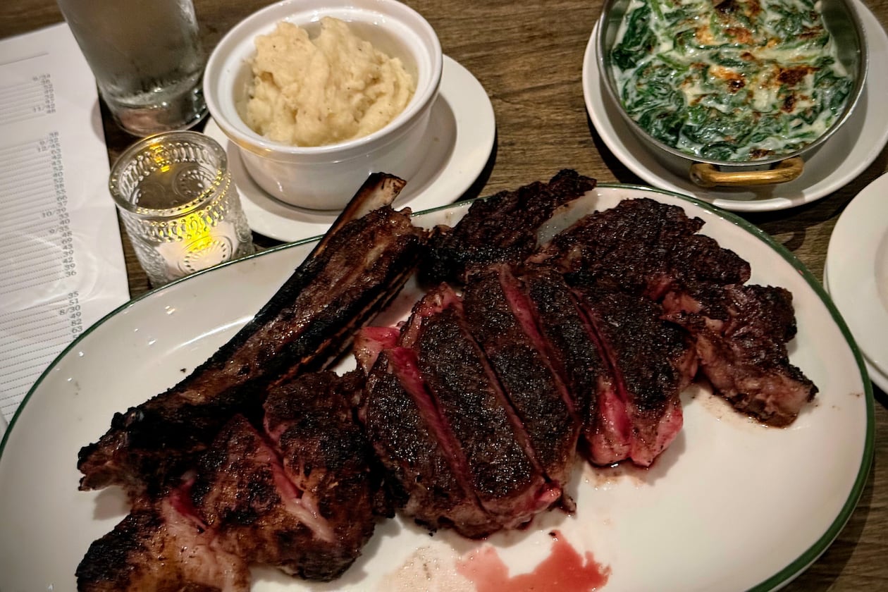 The presentation of this 2-pound American wagyu cowboy rib-eye at Vice Steak Bar left something to be desired. (Henri Hollis/AJC)