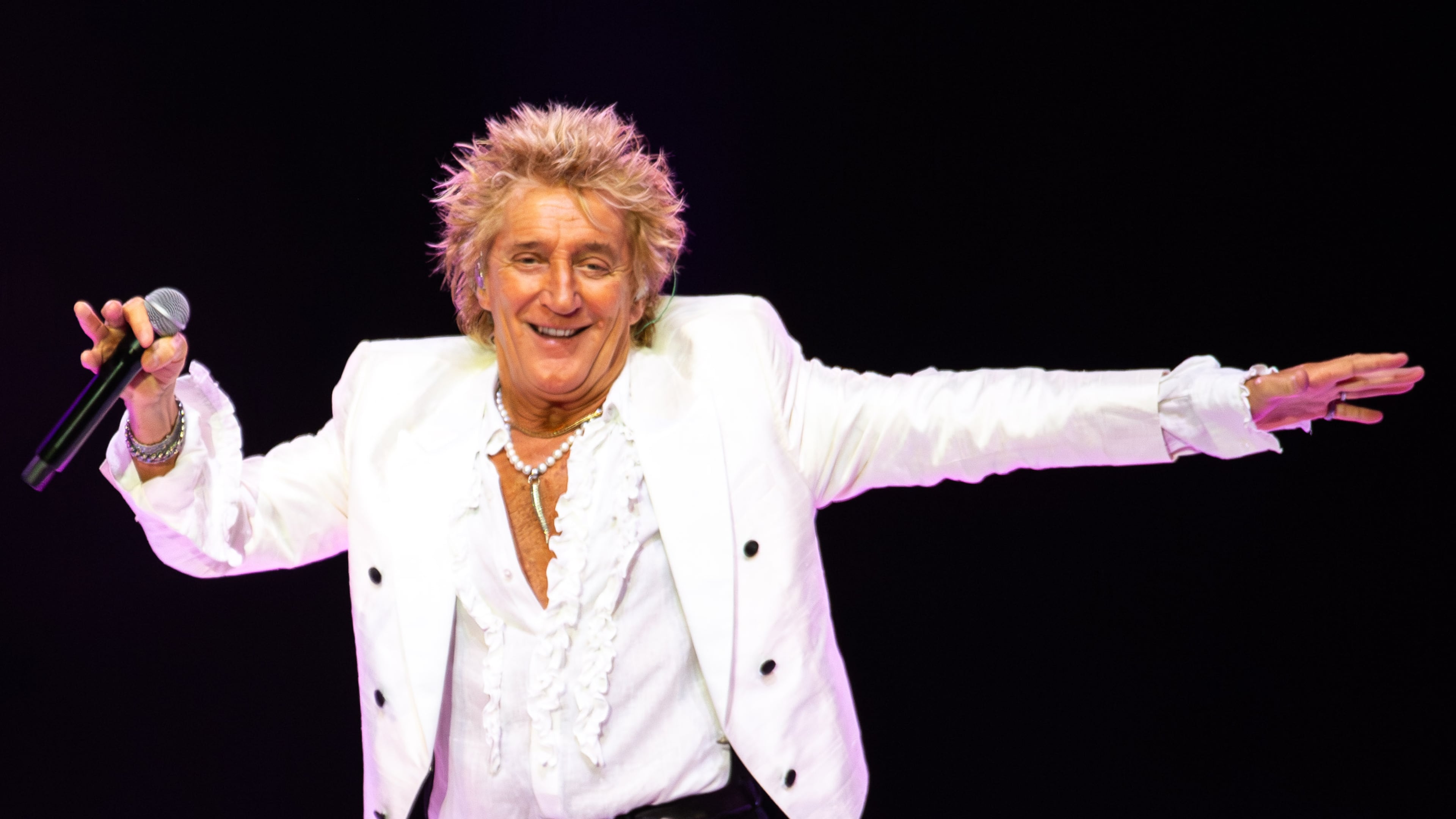 An 80-year-old Rod Stewart played all the hits during his One Last Time Tour on Friday, Aug. 1, 2025, at Ameris Bank Amphitheatre. Despite the title of the tour, this isn’t quite a farewell stint. (Ryan Fleisher for the AJC)