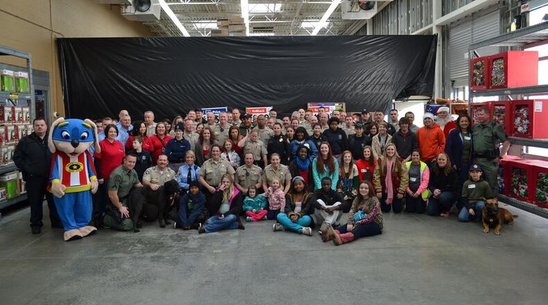 Thanks to the Paulding County Sheriff's Office, Paulding children in need should have a merrier Christmas when deputies take them shopping at Walmart during December.