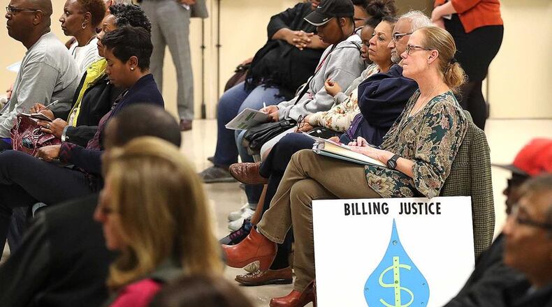 DeKalb County residents protested irregularities with water bills at a November county meeting. AJC file photo