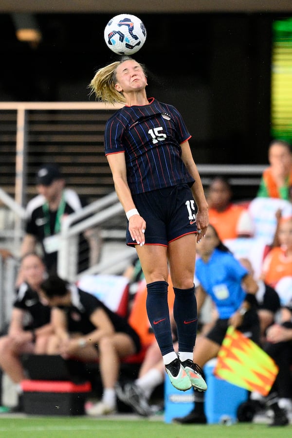 United States midfielder Claire Hutton (15) heads the ball during the first half of an international friendly soccer match against Canada, Wednesday, July 2, 2025, in Washington. (AP Photo/Nick Wass)