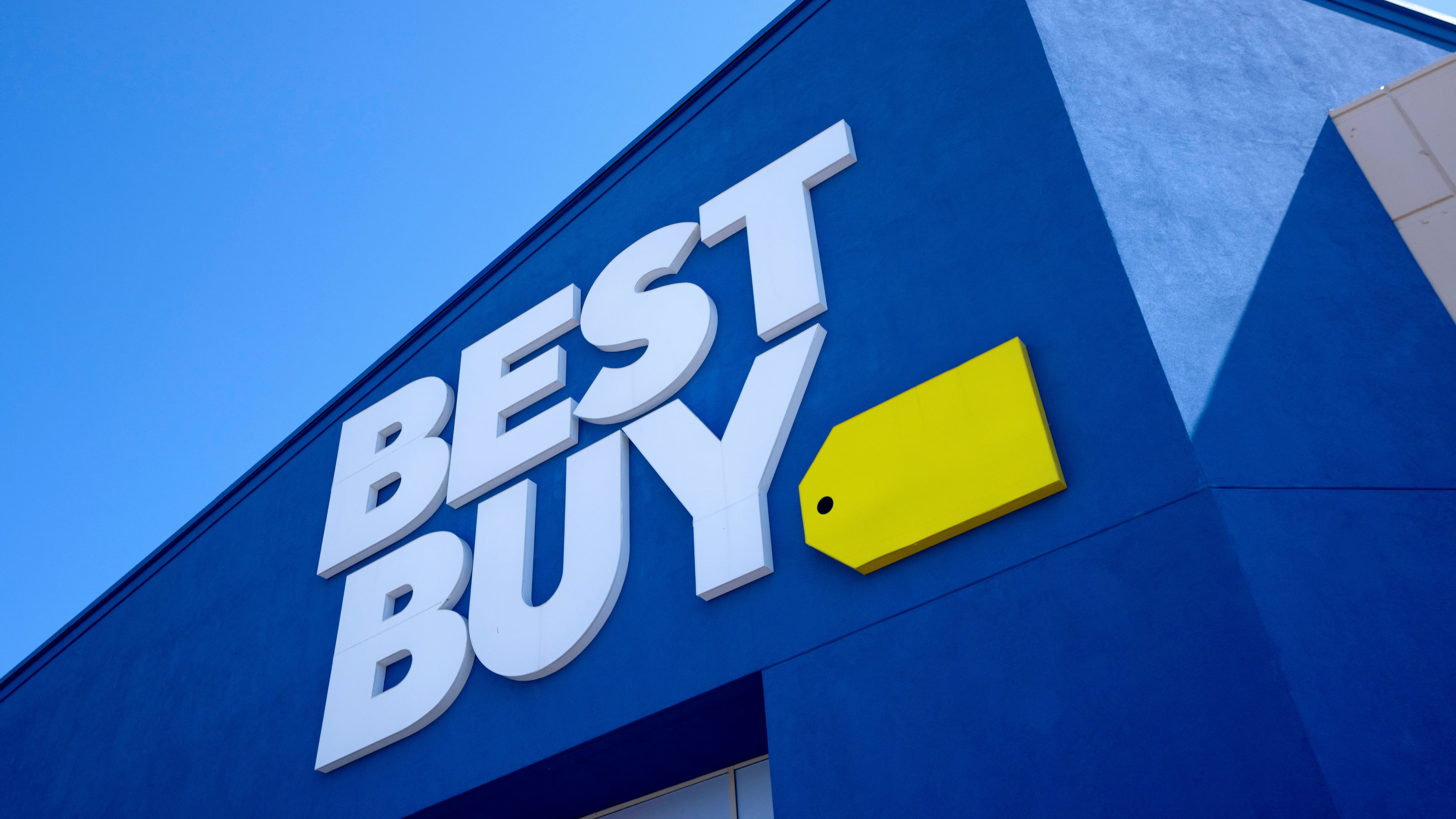 FILE - A Best Buy logo is shown at a store in Dallas on Oct. 25, 2024. (AP Photo/Tony Gutierrez, File)