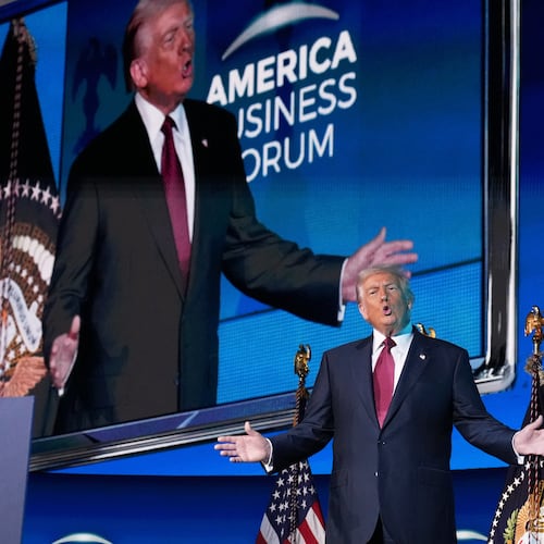 President Donald Trump arrives to speak to the America Business Forum Miami, at the Kaseya Center, Wednesday, Nov. 5, 2025, in Miami. (AP Photo/Jacquelyn Martin)