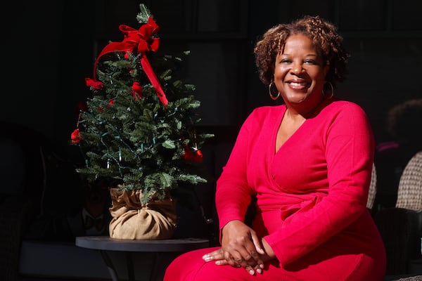 Author Tayari Jones said she begins planning her Christmas decor six months in advance and keeps a notebook to record her vision of a perfect Christmas along with thoughts about what did or did not work the previous year. (Abbey Cutrer/AJC)