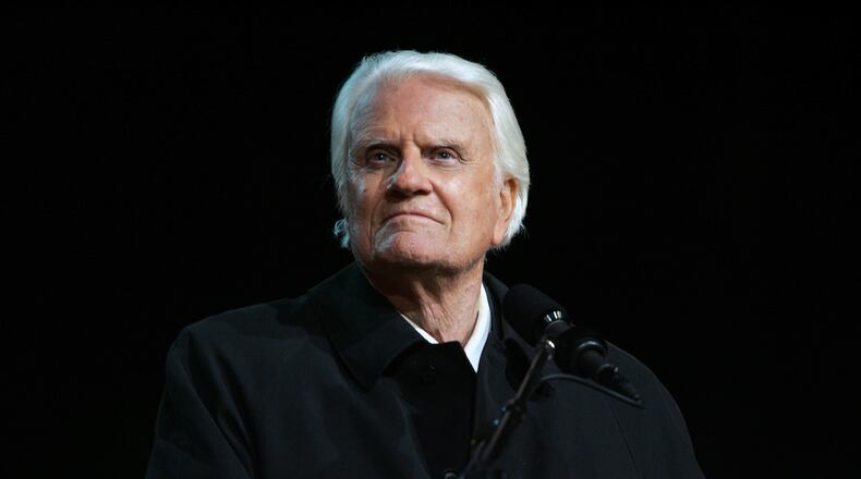 FILE — The Rev. Billy Graham speaks at the Rose Bowl in Pasadena, Calif., on Nov. 18, 2004. Graham, a North Carolina farmers son who preached to millions in stadium events he called crusades, becoming a pastor to presidents and the nations best-known Christian evangelist for more than 60 years, died on Wednesday, Feb. 21, 2018, at his home in North Carolina. He was 99. (Monica Almeida/The New York Times)