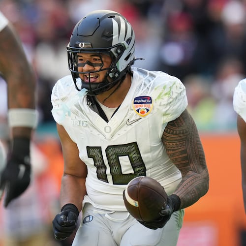 Oregon linebacker Matayo Uiagalelei (10) reacts after intercepting the football during the second half of the Orange Bowl College Football Playoff quarterfinal game against Texas Tech, Thursday, Jan. 1, 2026, in Miami Gardens, Fla. (AP Photo/Lynne Sladky)