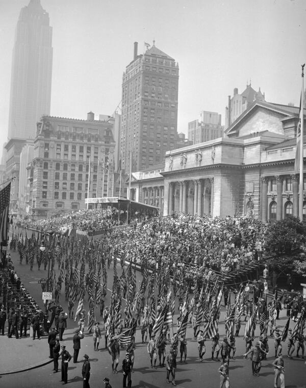 FILE - Almost 2 million people packed Fifth Avenue and side streets to witness New York's "At War Parade" June 13, 1942, in New York. (AP Photo)