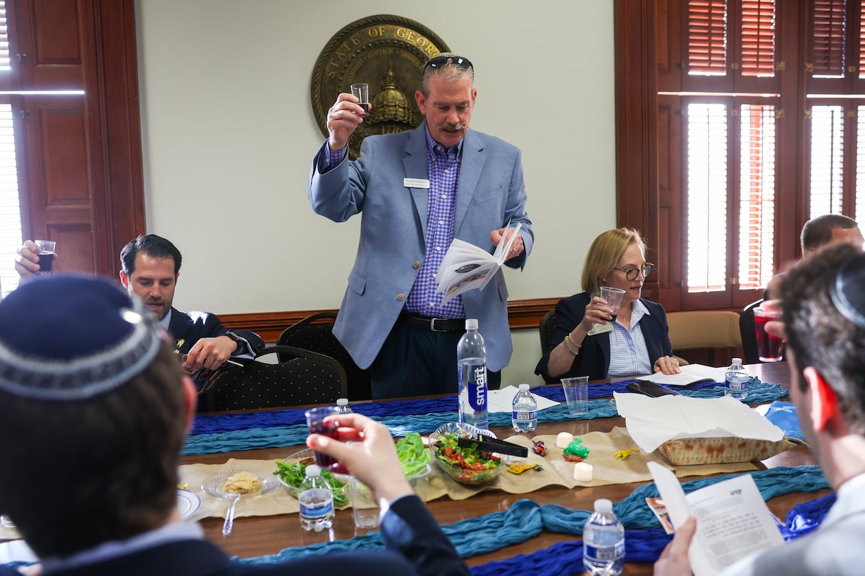 Roger Panitch presides over the Capitol’s first Passover Seder on Sine Die, the last day of the legislative session, in Atlanta on April 2, 2026. (Arvin Temkar/AJC)