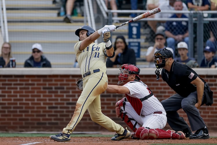 Georgia Tech's Ryan Zuckerman (11) hits a two RBI single against Oklahoma during the third inning of the Atlanta Regional game at Russ Chandler Stadium, Sunday, May 31, 2026, in Atlanta. Tech lost 15-8, setting up a rubber match with Oklahoma on Monday that will decide who advances. (Erik S. Lesser for the AJC)