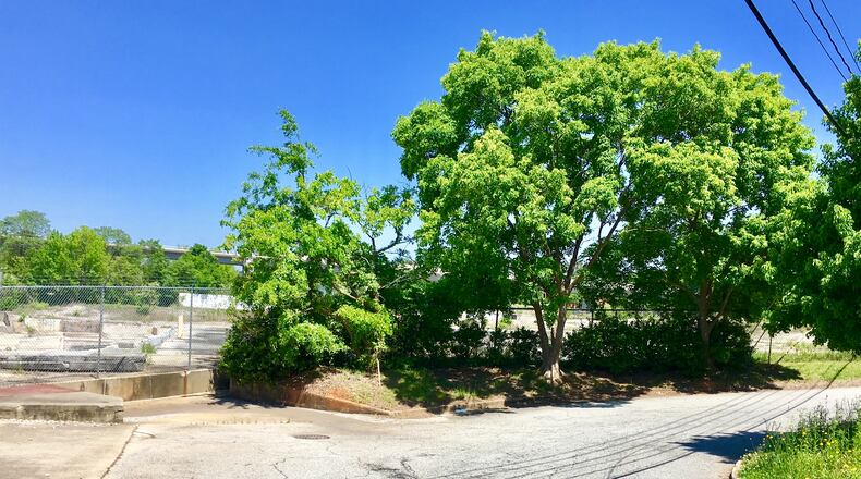Parry Street (right) and Center Street (foreground) dead end at this spot, just south of the old Fenner Dunlop mill site, now owned by Avila Real Estate. Avondale Estates’ commission has hired Pond & Company to design potential street grid improvements west of the downtown business district, which may include extending these streets. Bill Banks file photo for the AJC
