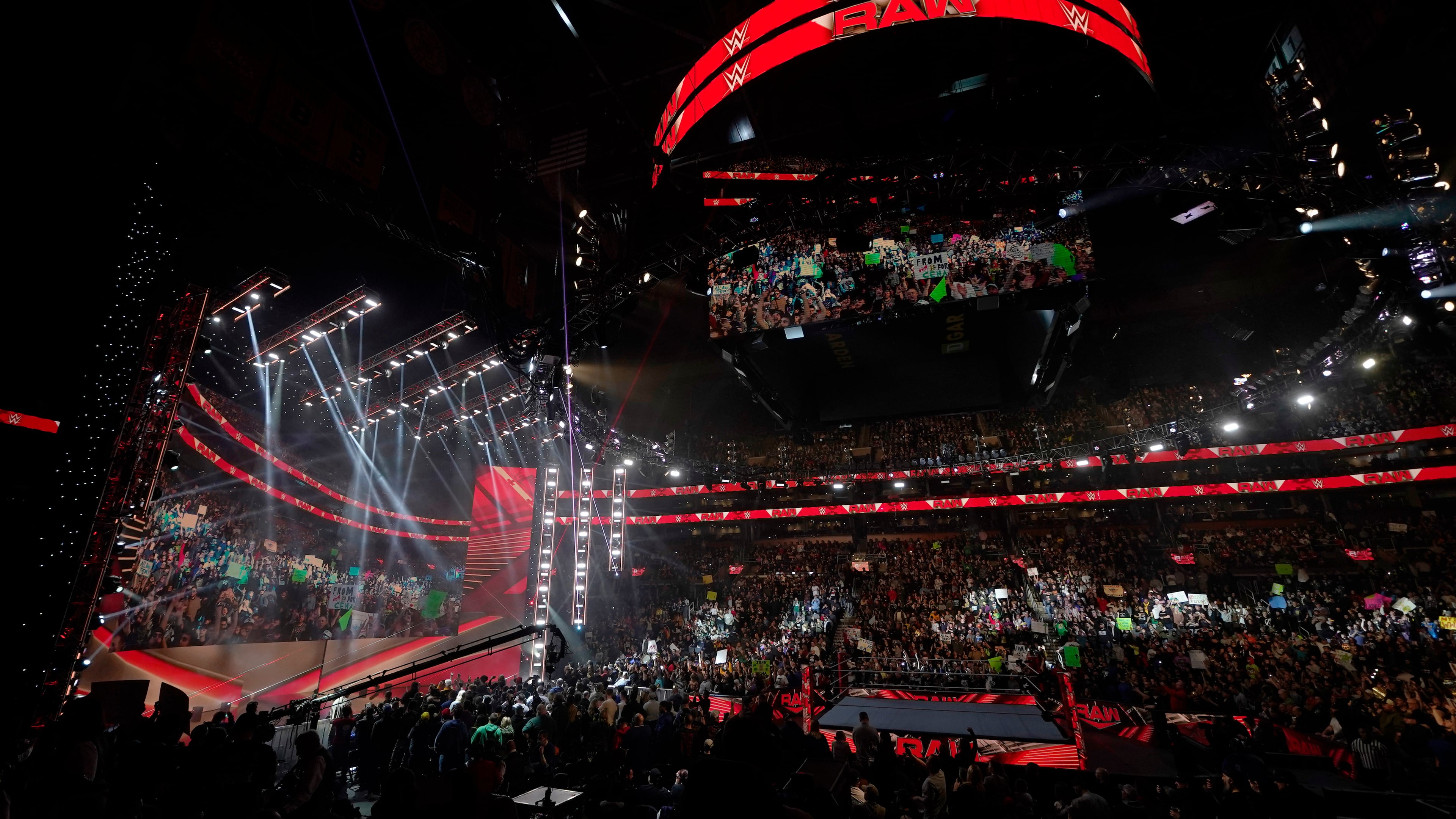 FILE - Bright lights illuminate the ring during the WWE Monday Night RAW event, Monday, March 6, 2023, in Boston. (AP Photo/Charles Krupa, File)