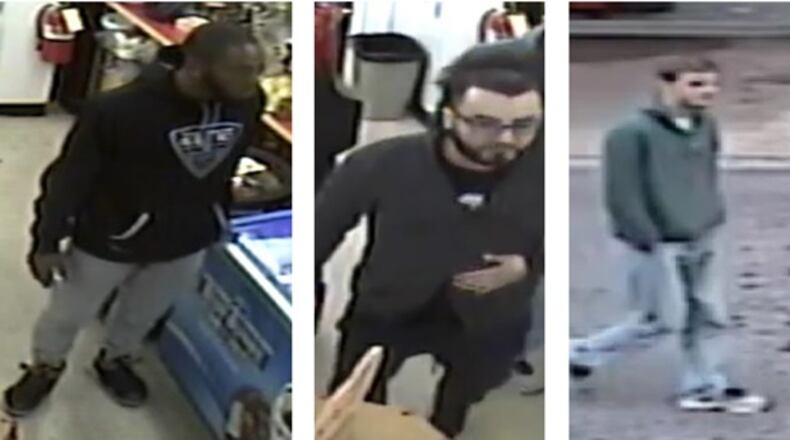 Gwinnett County police are looking for three suspects who posed as workers and tried to steal a glass display case with $100,000 of merchandise from a Neiman Marcus Last Call in Lawrenceville.