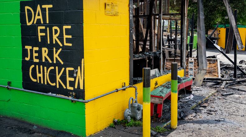 The fire broke out at the Dat Fire Jerk Chicken restaurant on Northside Drive on Saturday.