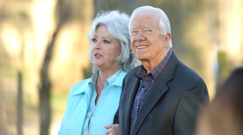 Paula Deen and Jimmy Carter, seen here in Plains in 2006, are teaming up for a unique fundraiser for the former president’s hometown in a few weeks. AJC FILE PHOTO