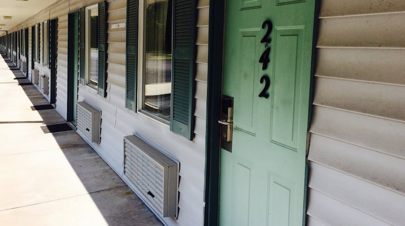 Room 242 at a former Motel 6 in Brunswick, Ga., just off I-95, is where former Glynn County police officer Dennis Krauss sexually assaulted a domestic violence victim. Now the State Board of Pardons and Paroles has restored his right to possess guns. ALAN JUDD/ALANJUDD@AJC.COM