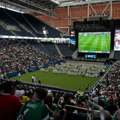 Spectators watch the opening match of the World Cup soccer tournament between Mexico and South Africa, Thursday, June 11, 2026, at the USTA Billie Jean King National Tennis Center in New York. (AP Photo/Yuki Iwamura)