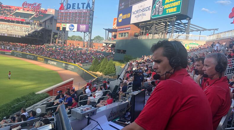 Play-by-play announcer Chip Caray (left) was joined by Tom Glavine (middle) and Jeff Francoeur for a 2019 telecast from the outfield stands at Truist Park (then named SunTrust Park). Caray and Francoeur again are scheduled to  broadcast from that spot at the Braves' game against the Marlins on Friday. (Bally Sports photo).