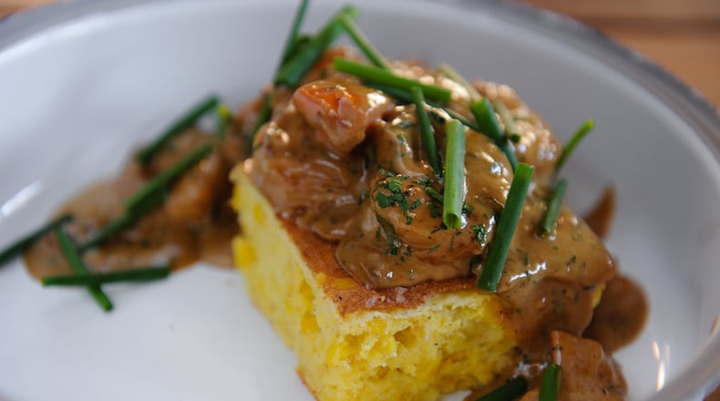 Barbecue shrimp at W.H. Stiles Fish Camp in the Ponce City Market arrives with spoonbread, but it’s the sauce you won’t forget. CONTRIBUTED BY BECKY STEIN