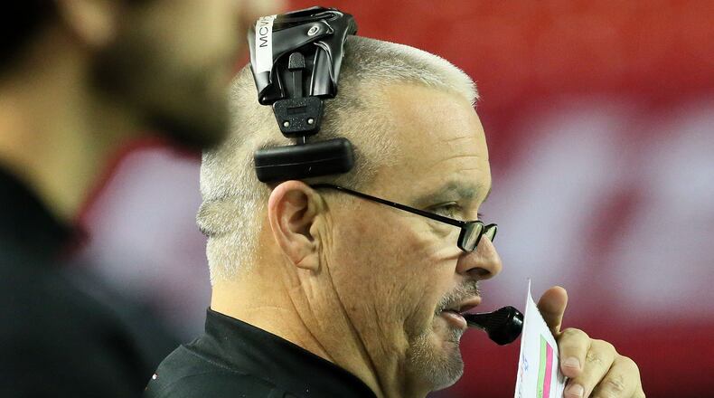 Charlton County's (Folkston, GA) head coach Rich McWhorter watches his team play against Marion County (Buena Vista) during their GHSA Class A-Public football Championship game at the Georgia Dome in Atlanta on Saturday, December 14, 2013.