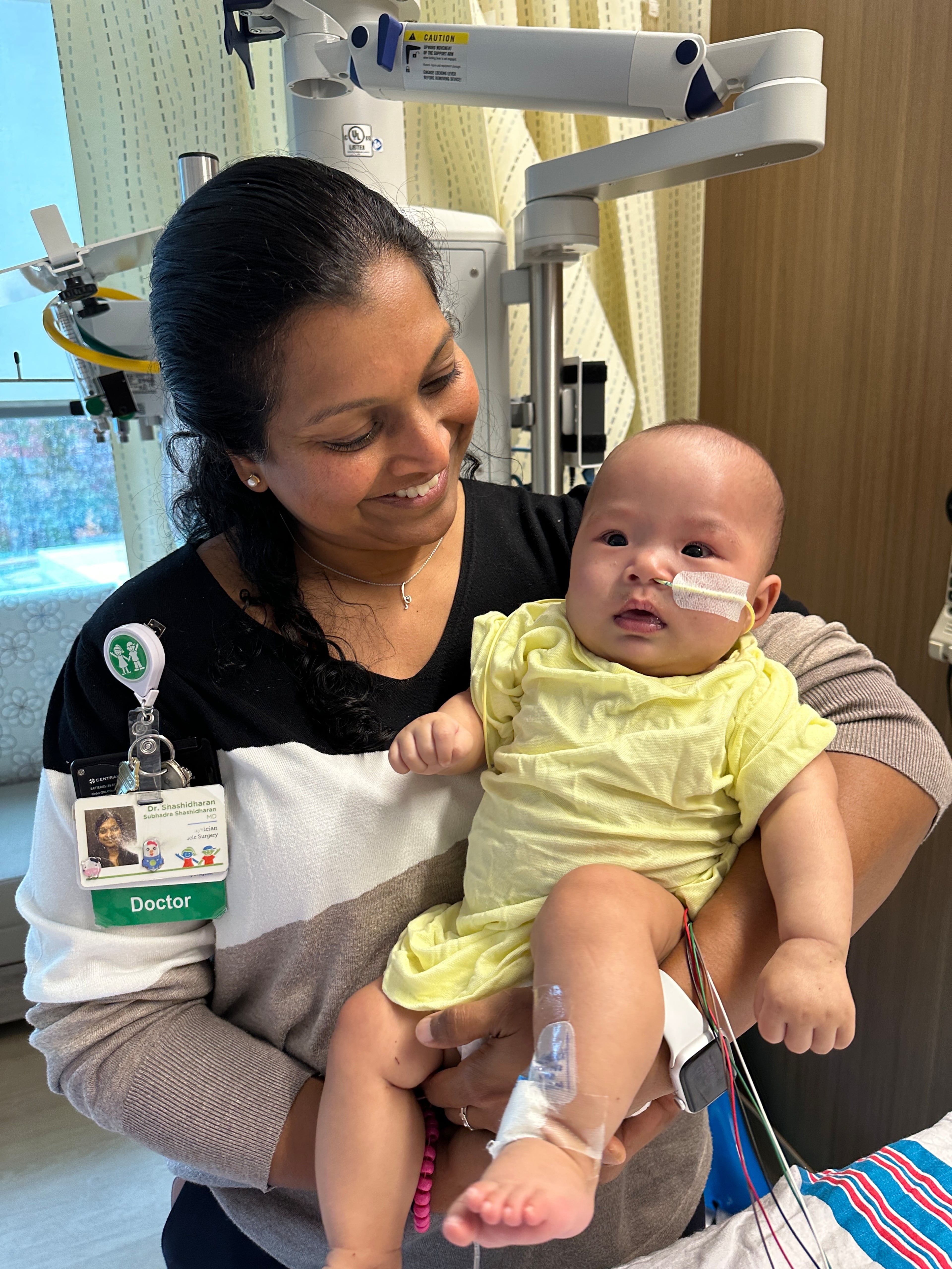 Chloe is held by a pediatric cardiologist at Children's Healthcare of Atlanta. (Photo provided by Children's Healthcare of Atlanta)