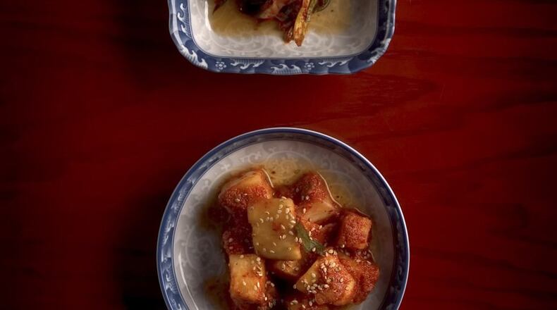 From top to bottom: Sliced horseradish kimchi, Chive kimchi, and cubed horseradish kimchi prepared at Jin Mi. (Kevin German/Sacramento Bee/TNS)