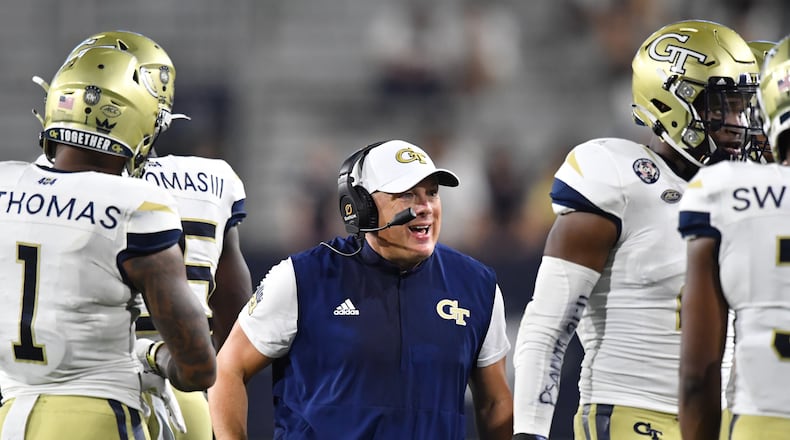 Georgia Tech head coach Geoff Collins instructs players during the second half Saturday, Sept. 4, 2021, against Northern Illinois at Bobby Dodd Stadium in Atlanta. (Hyosub Shin / Hyosub.Shin@ajc.com)