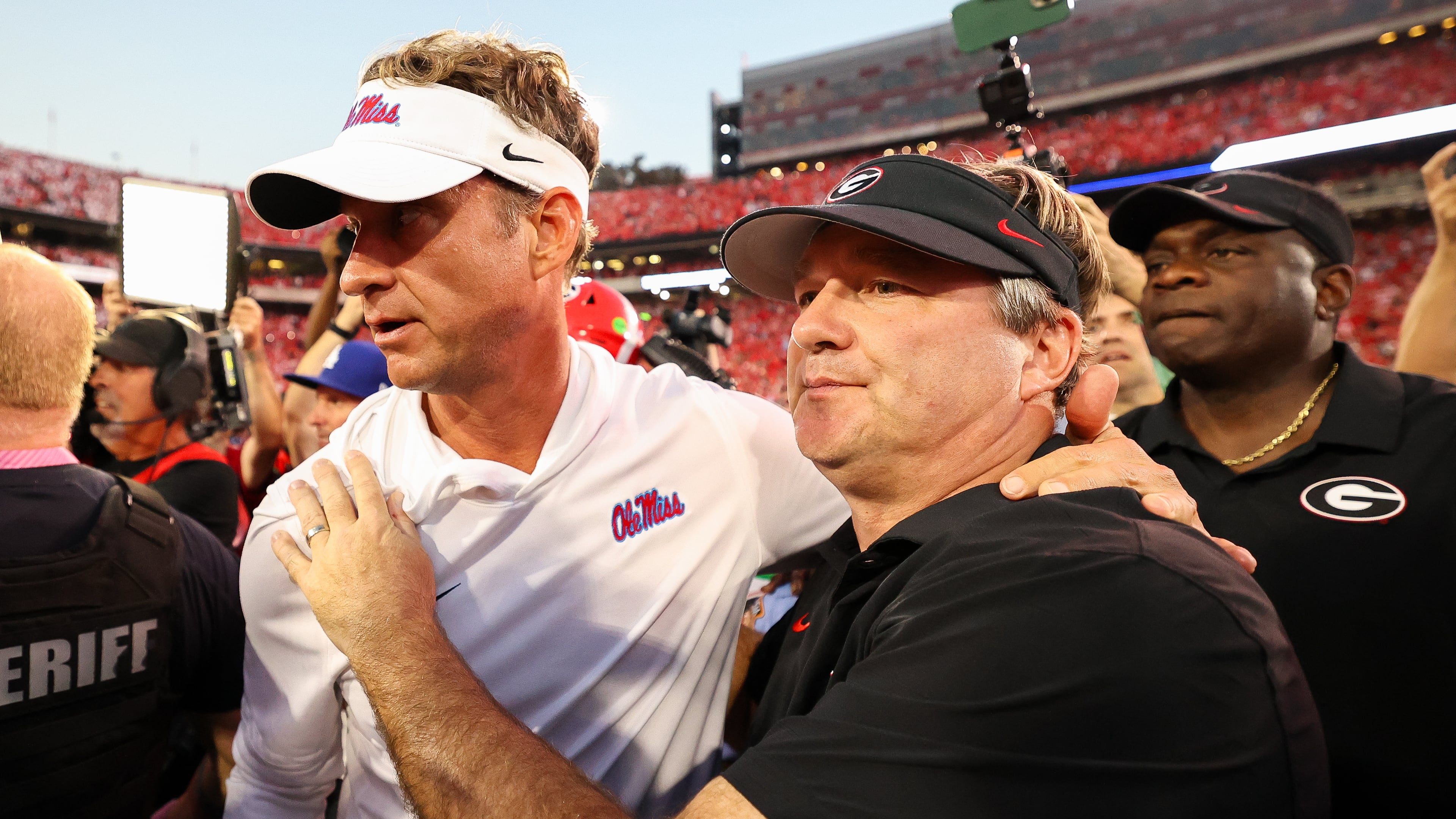 Mississippi head coach Lane Kiffin and Georgia head coach Kirby Smart bring out the best in each other when their teams clash with their different personalities and contrasting on-field strengths. (Colin Hubbard/AP)