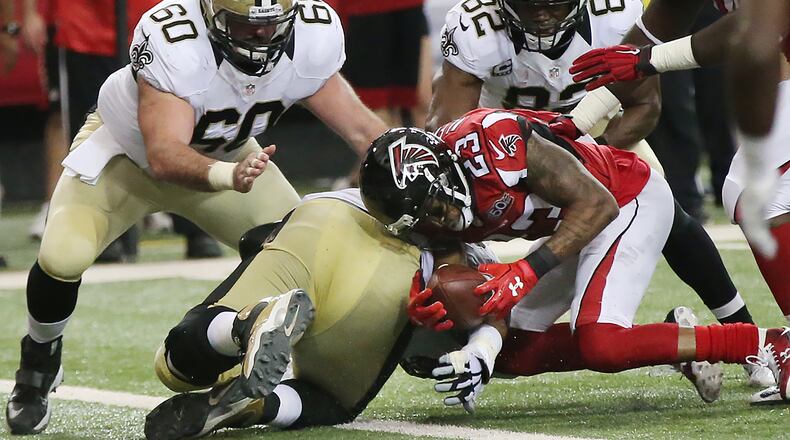 Falcons cornerback Robert Alford recovers a fumble by Saints running back Travaris Cadet at the one yard line during the fourth quarter in a January home game. Curtis Compton / ccompton@ajc.com Falcons cornerback Robert Alford recovers a fumble by Saints running back Travaris Cadet at the one yard line during the fourth quarter in a January home game. Curtis Compton / ccompton@ajc.com