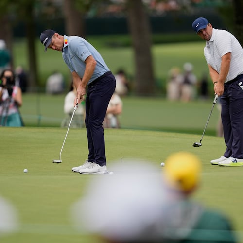 Justin Rose, of England, and Chris Gotterup putt on the seventh hole during a practice round ahead of the Masters golf tournament at the Augusta National Golf Club, Monday, April 6, 2026, in Augusta, Ga. (AP Photo/Ashley Landis)
