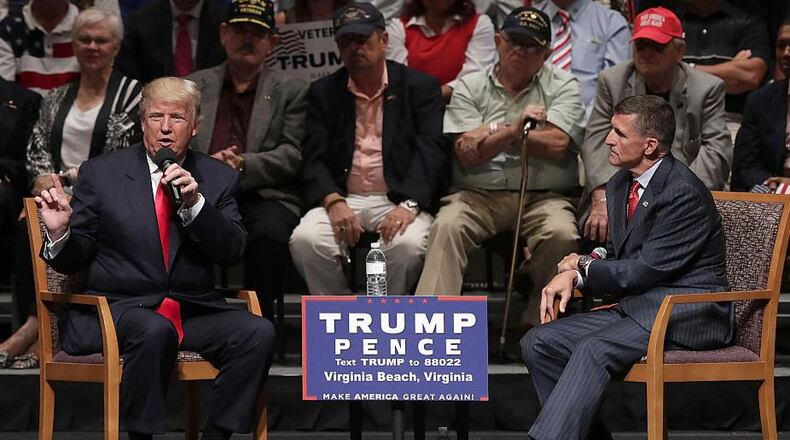 FILE PHOTO: Republican presidential nominee Donald Trump (L) speaks during a campaign event September 6, 2016 in Virginia Beach, Virginia. Trump participated in a discussion with retired Army Lieutenant General Michael Flynn (R).  (Photo by Alex Wong/Getty Images)