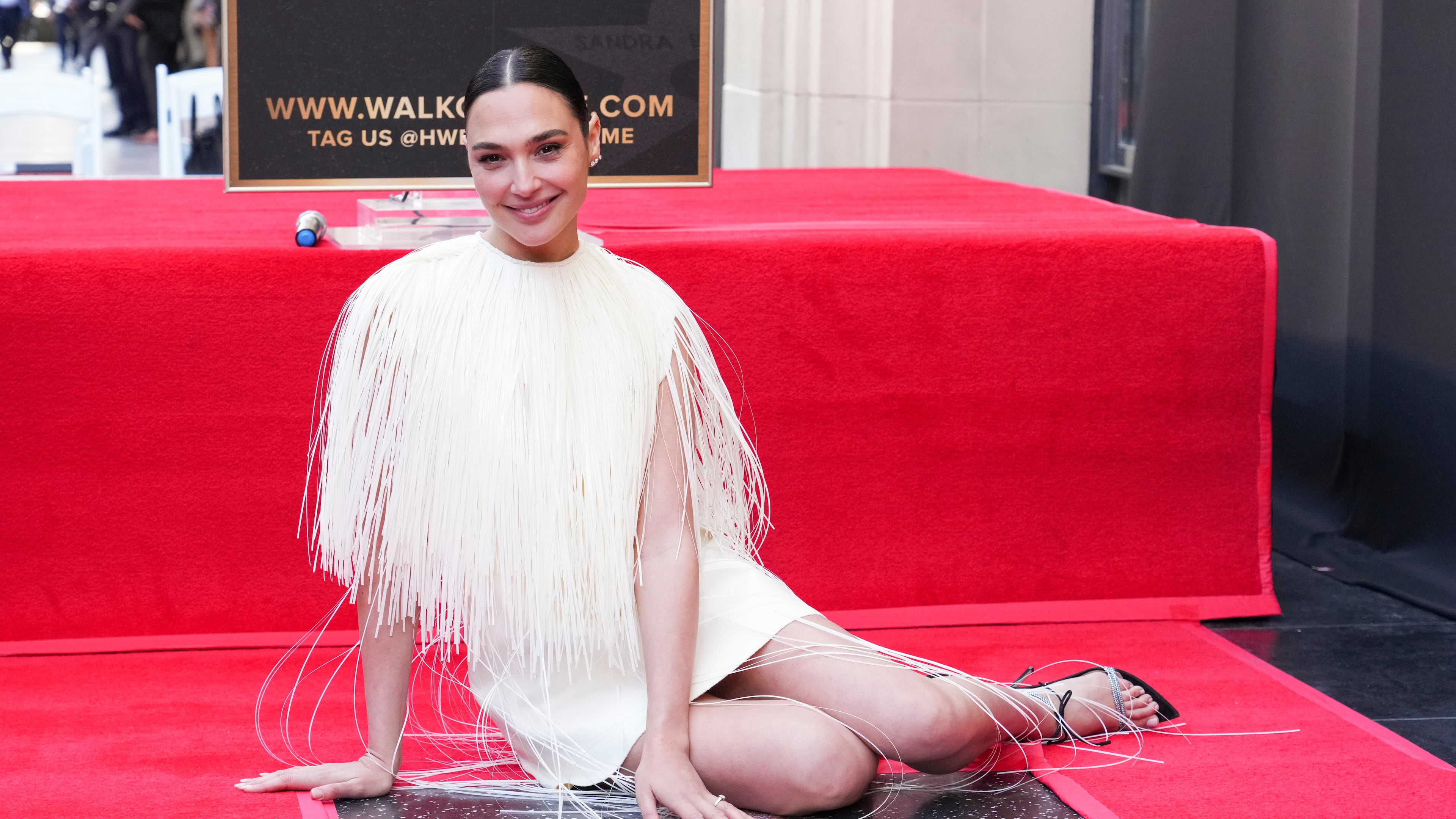 FILE - Gal Gadot poses with her new star at a ceremony honoring her on the Hollywood Walk of Fame on Tuesday, March 18, 2025, in Los Angeles. (Photo by Jordan Strauss/Invision/AP, file)